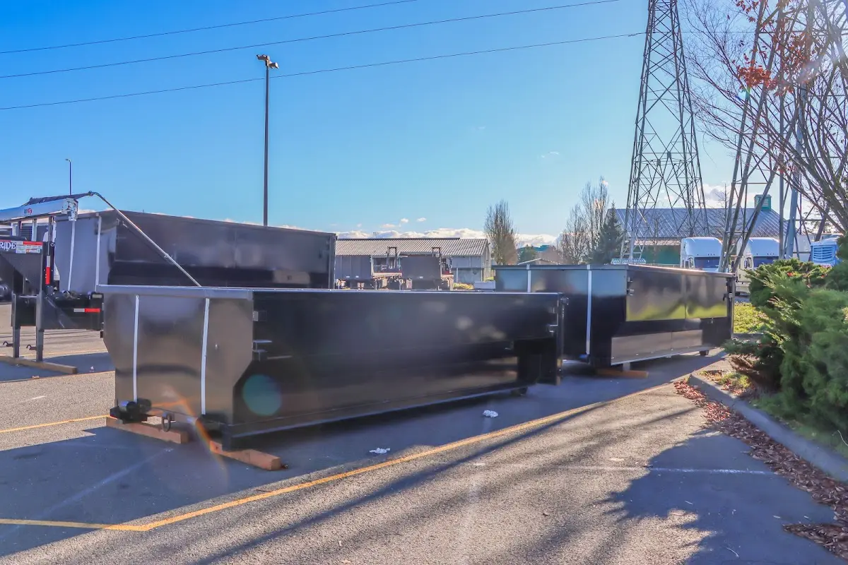 Roll-off dumpster ready for waste disposal at job site for Yard Waste Dumpster Rental in St. Gabriel